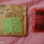 Корпус в упаковке. Рядом конверт HongKong post